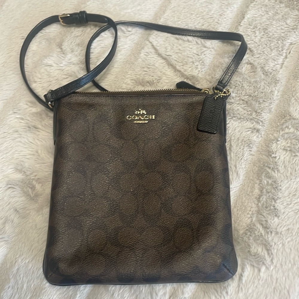 Barely carried. Brown Coach purse. Used like new.